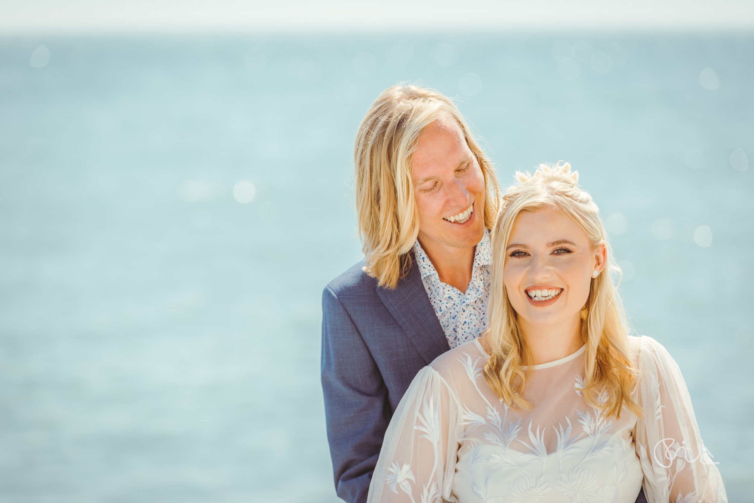 Bride and groom on Eastbourne Beach