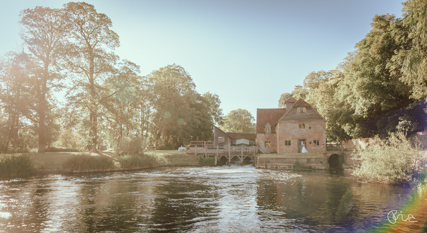 Bride and groom at Mapledurham Mill