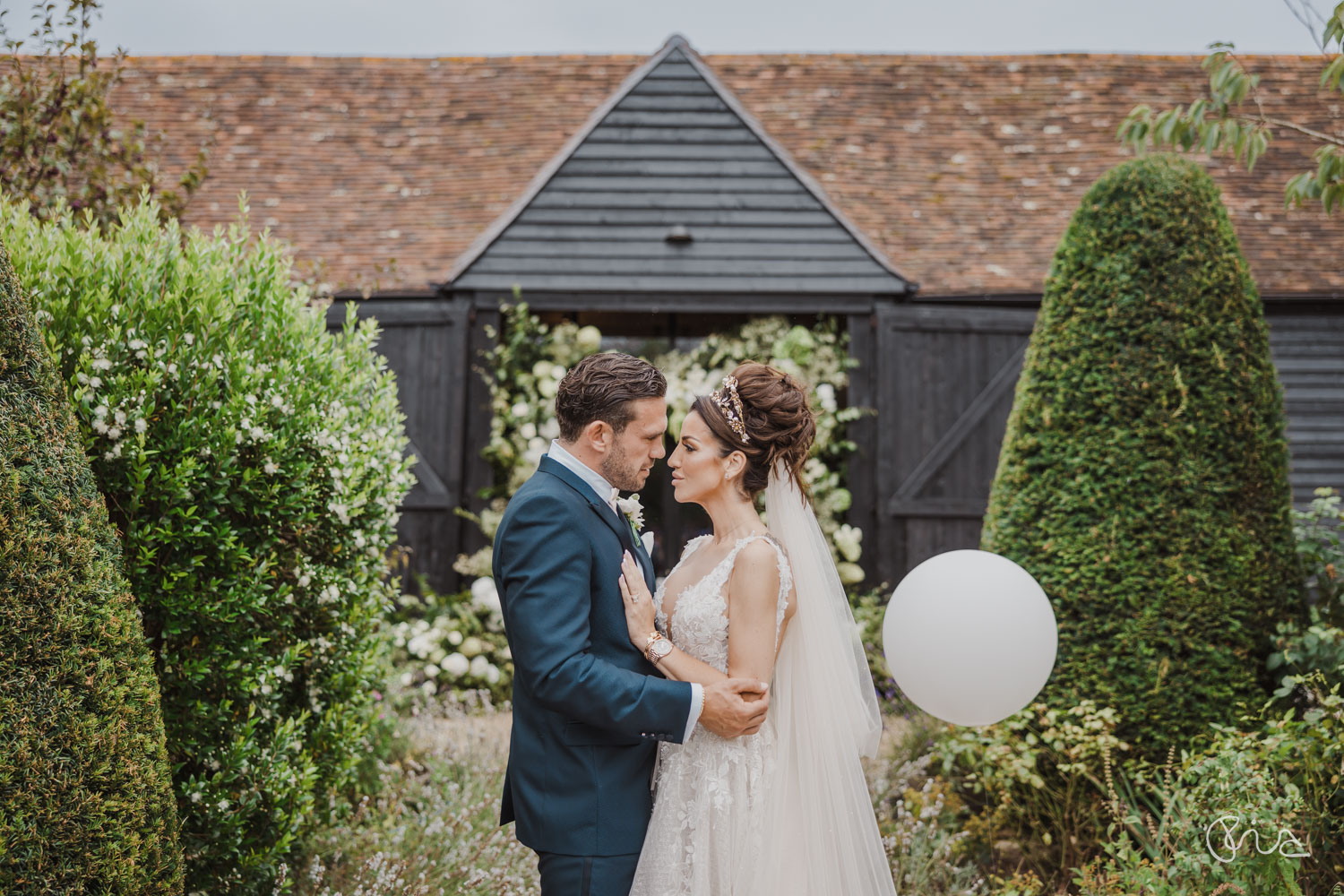 Bride and groom at Alfriston Gardens